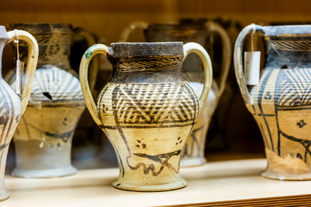 Malaga, Spain - October 21, 2023:Various mixed pottery artifacts at Malaga museum, Spain.のeditorial素材