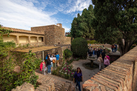 Malaga, Spain - October 21, 2023: Alcazaba de Velez Fortress exterior architecture details located in the city of Malaga, Spain.のeditorial素材