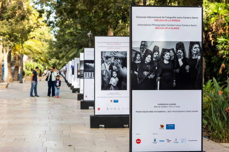 Malaga, Spain - October 21, 2023: Photography exhibition at an urban park in the city of Malaga,...