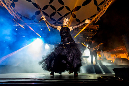 FARO, PORTUGAL: 7th SEPTEMBER, 2023 - Music band, Mimicat, performs at Festival F, a big festival in the city of Faro, Portugal.のeditorial素材