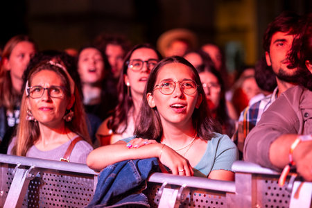 FARO, PORTUGAL: 7th SEPTEMBER, 2023 - Audience watch music artist on Festival F, a big festival in the city of Faro, Portugal.のeditorial素材