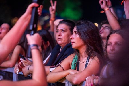 FARO, PORTUGAL: 7th SEPTEMBER, 2023 - Audience watch music artist on Festival F, a big festival in the city of Faro, Portugal.のeditorial素材