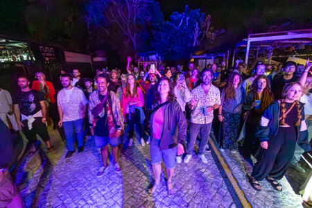 FARO, PORTUGAL: 7th SEPTEMBER, 2023 - Audience watch music artist on Festival F, a big festival in the city of Faro, Portugal.のeditorial素材
