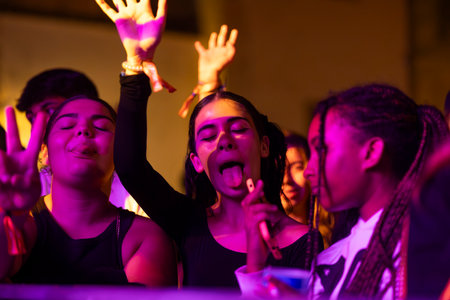 FARO, PORTUGAL: 7th SEPTEMBER, 2023 - Audience watch music artist on Festival F, a big festival in the city of Faro, Portugal.のeditorial素材