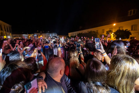 FARO, PORTUGAL: 7th SEPTEMBER, 2023 - Audience watch music artist on Festival F, a big festival in the city of Faro, Portugal.のeditorial素材