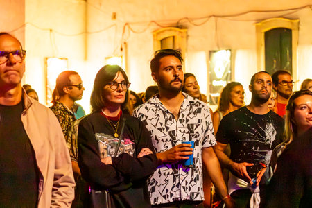 FARO, PORTUGAL: 7th SEPTEMBER, 2023 - Audience watch music artist on Festival F, a big festival in the city of Faro, Portugal.のeditorial素材