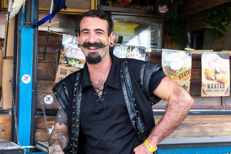 FARO, PORTUGAL: 8th SEPTEMBER, 2023 - Sellers sell street food in music Festival F, a big festival in the city of Faro, Portugal.のeditorial素材