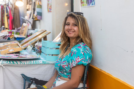 FARO, PORTUGAL: 7th SEPTEMBER, 2023 - Sellers sell clothing and accessories in music Festival F, a big festival in the city of Faro, Portugal.のeditorial素材