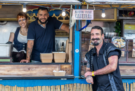 FARO, PORTUGAL: 8th SEPTEMBER, 2023 - Sellers sell street food in music Festival F, a big festival in the city of Faro, Portugal.のeditorial素材