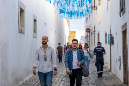 FARO, PORTUGAL: 7th SEPTEMBER, 2023 - Young female teen visitors arrive at music Festival F, a big festival in the city of Faro, Portugal.のeditorial素材