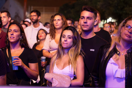 FARO, PORTUGAL: 8th SEPTEMBER, 2023 - Audience watch music artist on Festival F, a big festival in the city of Faro, Portugal.のeditorial素材