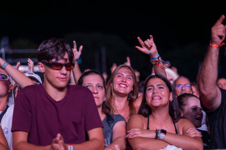 FARO, PORTUGAL: 8th SEPTEMBER, 2023 - Audience watch music artist on Festival F, a big festival in the city of Faro, Portugal.のeditorial素材