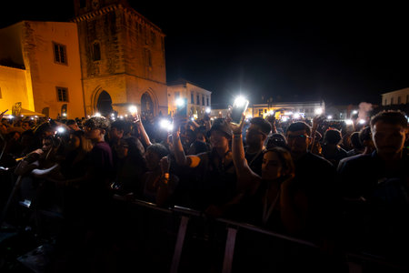 FARO, PORTUGAL: 9th SEPTEMBER, 2023 - Audience watch music artist on Festival F, a big festival in the city of Faro, Portugal.のeditorial素材