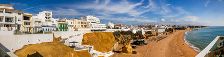 Landscape view of the coast of Albufeira city, located in the Algarve region, Portugal.の写真素材