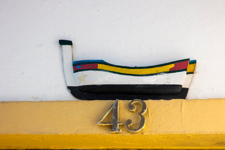 A close up of a 3D of number forty three and a Portuguese fishing boat.の写真素材