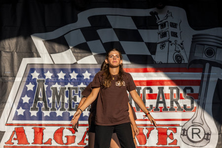 FARO, PORTUGAL, 04th August 2024: American Cars Show Algarve Event with vintage cars and a mix of Americana related activities happening, including pinup shows, rockabilly concerts and dance groups, among others.のeditorial素材