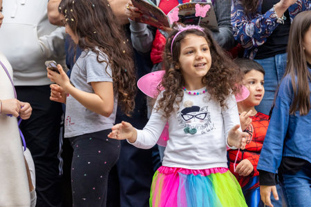 LOULE, PORTUGAL - 17th FEB 2024: Colorful Carnival (Carnaval) Parade festival audience participants on Loule city, Portugal.のeditorial素材