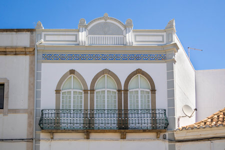 Typical beautiful architecture of platbands in Sao Bras de Alportel village, Portugal