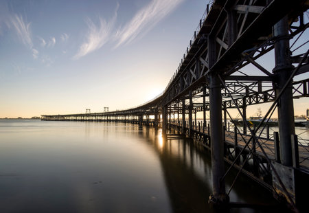 Muelle del Rio Tinto iron structure renovated boardwalk docks located in Huelva, Spain.の写真素材