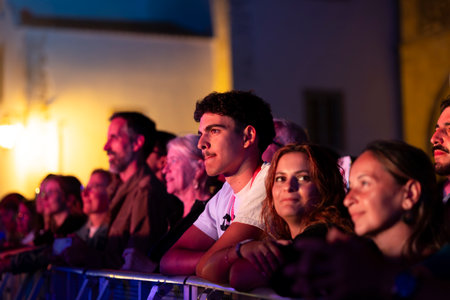 FARO, PORTUGAL: 5th SEPTEMBER, 2024 - Audience watch music artist in the Music Festival F, a big festival on the city of Faro, Portugalのeditorial素材