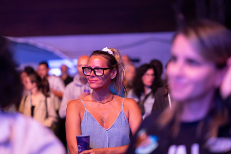 FARO, PORTUGAL: 5th SEPTEMBER, 2024 - Audience watch music artist in the Music Festival F, a big festival in the city of Faro, Portugalのeditorial素材
