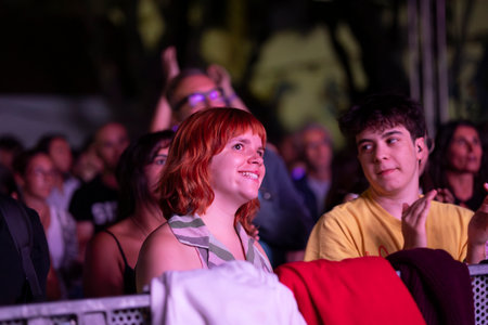 FARO, PORTUGAL: 5th SEPTEMBER, 2024 - Audience watch music artist in the Music Festival F, a big festival in the city of Faro, Portugalのeditorial素材