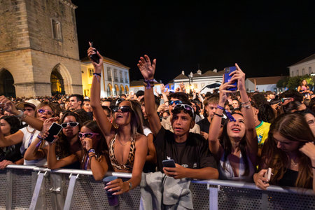 FARO, PORTUGAL: 5th SEPTEMBER, 2024 - Audience watch music artist in the Music Festival F, a big festival on the city of Faro, Portugalのeditorial素材