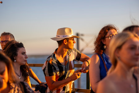 FARO, PORTUGAL: 5th SEPTEMBER, 2024 - Audience watch music artist in the Music Festival F, a big festival on the city of Faro, Portugalのeditorial素材