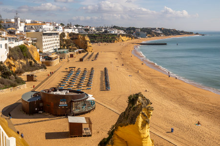 ALBUFEIRA, PORTUGAL - 9th NOVEMBER 2024: Landscape view of the coast of Albufeira city, located in the Algarve region, Portugal.のeditorial素材