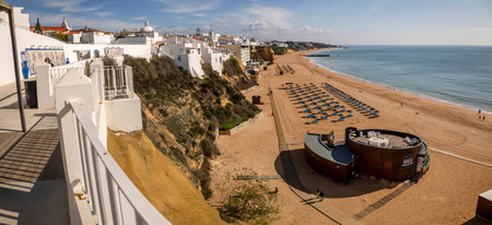 ALBUFEIRA, PORTUGAL - 9th NOVEMBER 2024: Landscape view of the coast of Albufeira city, located in the Algarve region, Portugal.のeditorial素材