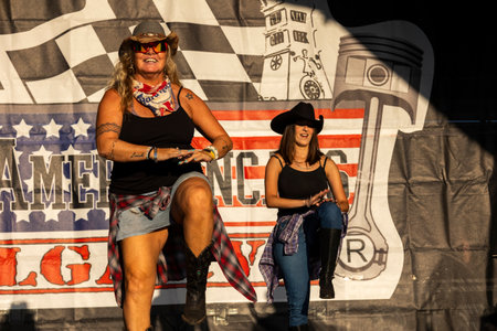 FARO, PORTUGAL, 04th August 2024: American Cars Show Algarve Event with vintage cars and a mix of Americana related activities happen, including pinup shows, rockabilly concerts and dance groups, among others.のeditorial素材