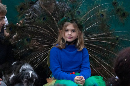 LOULE, PORTUGAL - 17th FEB 2024: Colorful Carnival (Carnaval) Parade festival audience participants on Loule city, Portugal.のeditorial素材
