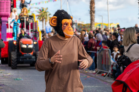 QUARTEIRA, PORTUGAL - 13th FEB 2024: Colorful Carnival (Carnaval) Parade festival participants on Quarteira city, Portugal.のeditorial素材