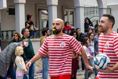 LOULE, PORTUGAL - 17th FEB 2024: Colorful Carnival (Carnaval) Parade festival participants on Loule city, Portugal.のeditorial素材