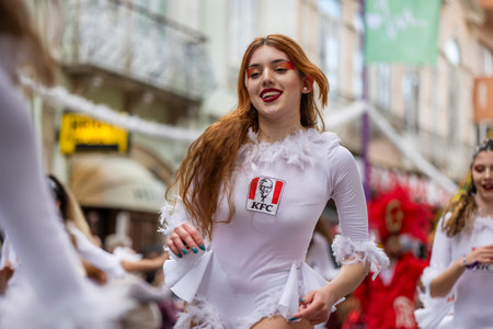 LOULE, PORTUGAL - 17th FEB 2024: Colorful Carnival (Carnaval) Parade festival participants on Loule city, Portugal.のeditorial素材