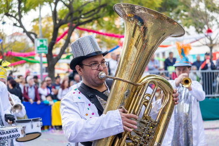LOULE, PORTUGAL - 17th FEB 2024: Colorful Carnival (Carnaval) Parade festival participants on Loule city, Portugal.のeditorial素材