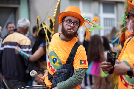 LOULE, PORTUGAL - 17th FEB 2024: Colorful Carnival (Carnaval) Parade festival participants on Loule city, Portugal.のeditorial素材