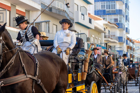 SAO BRAS DE ALPORTE, PORTUGAL - 4th MAY 2024: Period representation event of Carriage coupling traditional event with beautiful carriages with horses and person dressed for the occasion.のeditorial素材