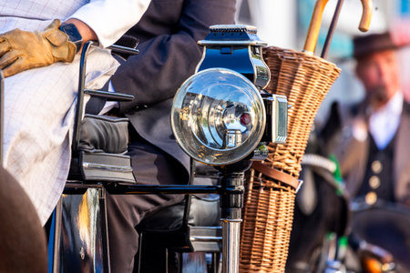 Detail of light on a Carriage coupling traditional event with beautiful carriages with horses and person dressed for the occasion.の写真素材