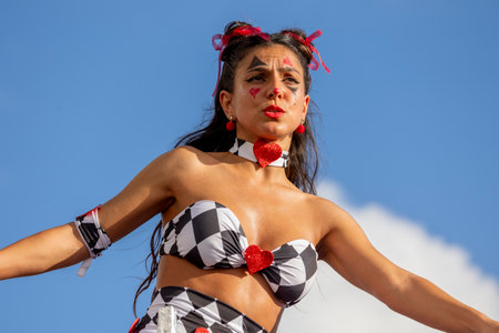 QUARTEIRA, PORTUGAL - 13th FEB 2024: Colorful Carnival (Carnaval) Parade festival participants on Quarteira city, Portugal.のeditorial素材