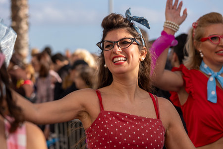 QUARTEIRA, PORTUGAL - 13th FEB 2024: Colorful Carnival (Carnaval) Parade festival participants on Quarteira city, Portugal.のeditorial素材