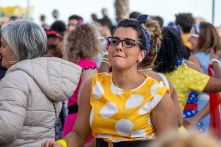 QUARTEIRA, PORTUGAL - 13th FEB 2024: Colorful Carnival (Carnaval) Parade festival participants on Quarteira city, Portugal.のeditorial素材