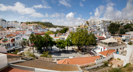 ALBUFEIRA, PORTUGAL - 7th MAY 2024: Traditional portuguese architecture of houses in the region of Albufeira, Portugal.のeditorial素材