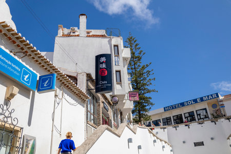 ALBUFEIRA, PORTUGAL - 7th MAY 2024: Traditional portuguese architecture of houses in the region of Albufeira, Portugal.のeditorial素材