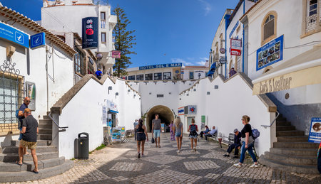 ALBUFEIRA, PORTUGAL - 7th MAY 2024: Traditional portuguese architecture of houses in the region of Albufeira, Portugal.のeditorial素材
