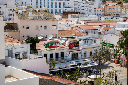 ALBUFEIRA, PORTUGAL - 7th MAY 2024: Traditional portuguese architecture of houses in the region of Albufeira, Portugal.のeditorial素材