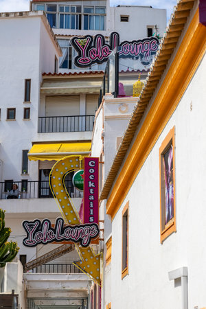 ALBUFEIRA, PORTUGAL - 7th MAY 2024: Albufeira city downtown businesses with tourists having a good time in the bars and restaurants.のeditorial素材
