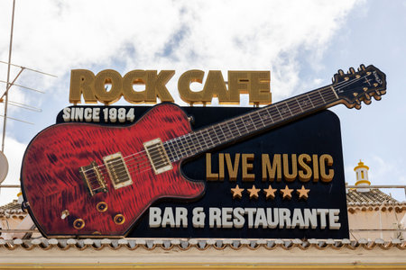 ALBUFEIRA, PORTUGAL - 7th MAY 2024: Albufeira city downtown businesses with tourists having a good time in the bars and restaurants.のeditorial素材