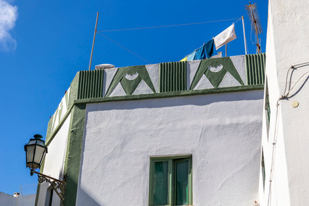 Traditional portuguese architecture of houses in the region of Albufeira, Portugal.の写真素材