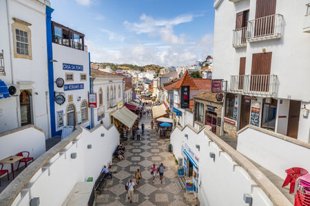 ALBUFEIRA, PORTUGAL - 7th MAY 2024: Traditional portuguese architecture of houses in the region of Albufeira, Portugal.のeditorial素材